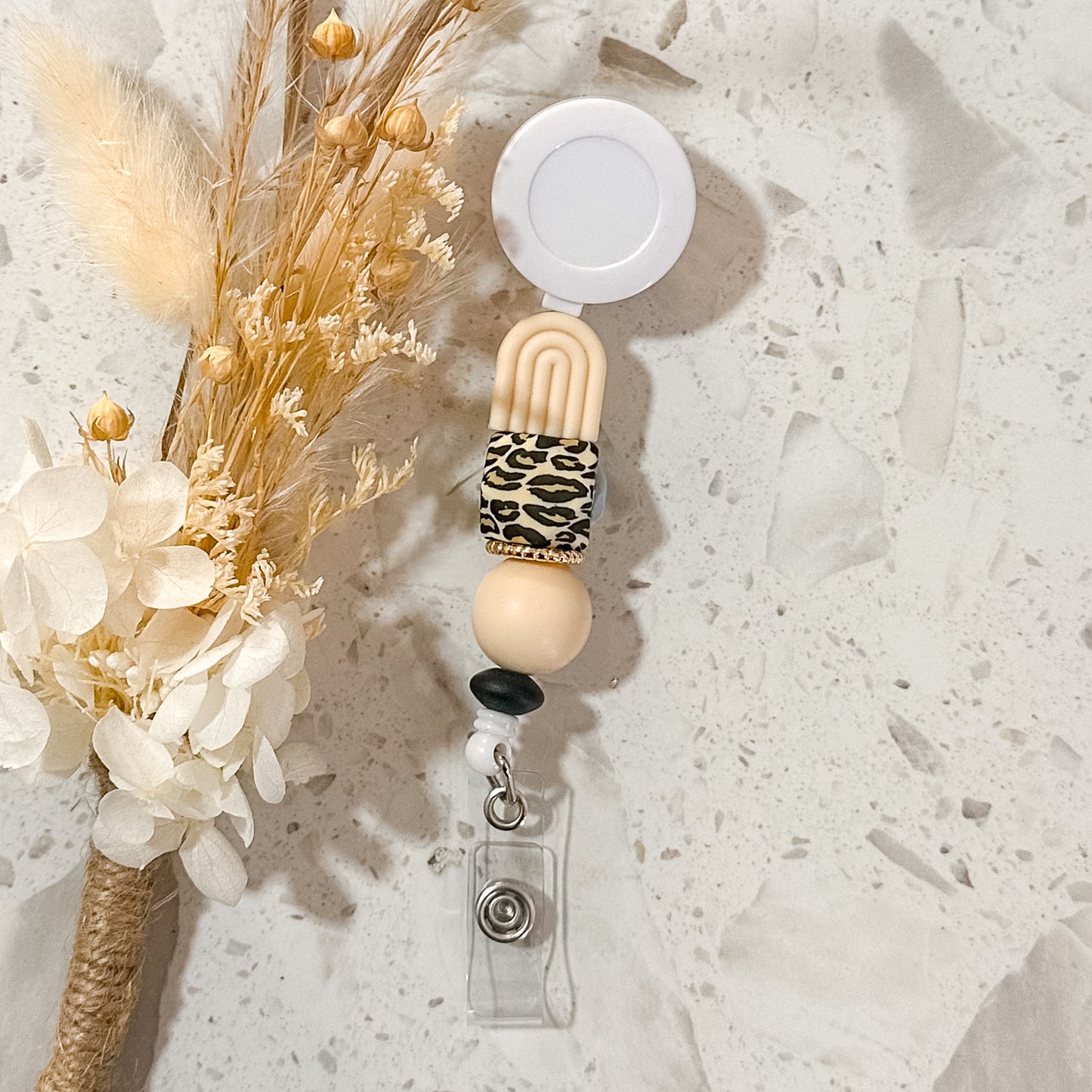 Arch Badge Reel | Cream | Leopard Hex