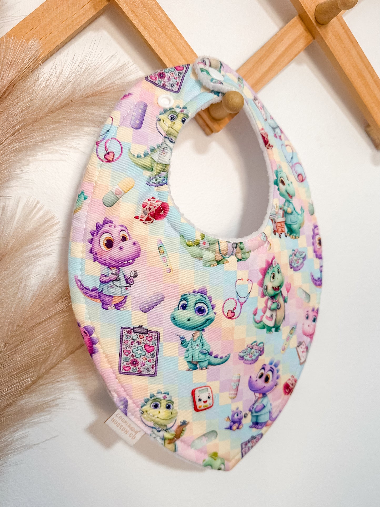 Dino Nurse Bibs