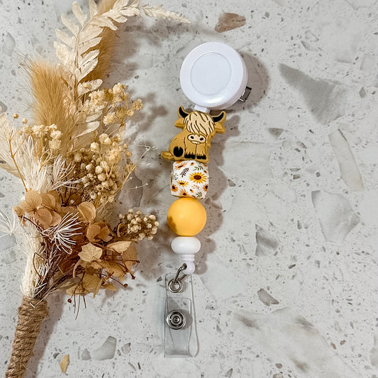 Highland Cow Badge Reel | Cream