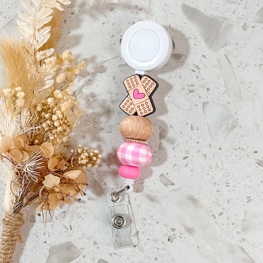 Bandaid Badge Reel